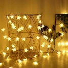 Vánoční světelný závěs 20 LED hvězdy teplá bílá DA324B